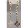 Boucles d'oreilles à croix basque liée à une chaîne à boules. Bijou basque en argent 925 disponible sur bijoux-basque.com